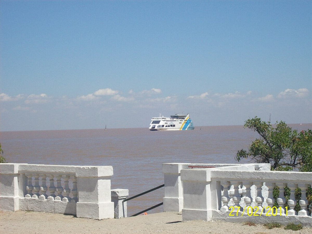 A Buquebus fast catamaran crossing the brown waters of the Rio de la Plata between Argentina and Uruguay