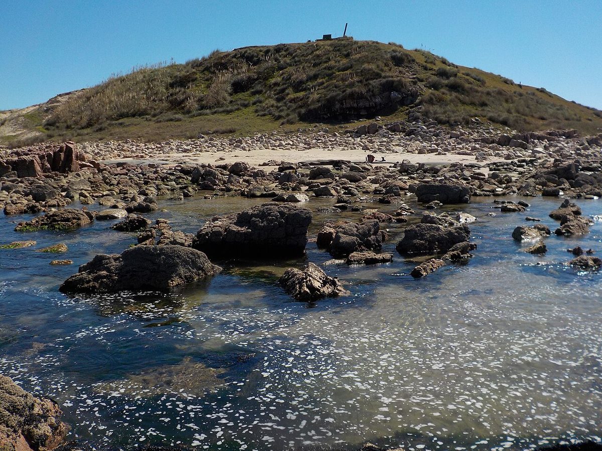 Rocky green headland and Atlantic coastline at Cerro Verde near La Coronilla in Rocha, Uruguay