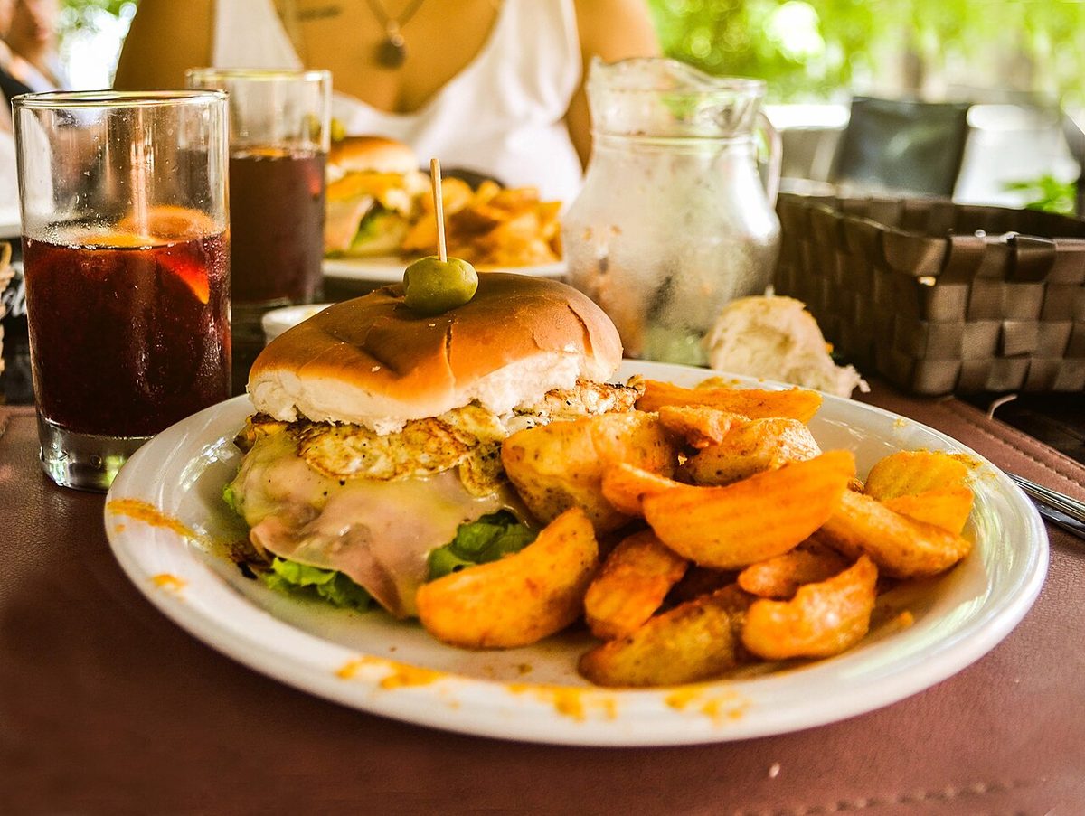 A chivito, the Uruguayan steak sandwich piled with ham, cheese, egg and fries
