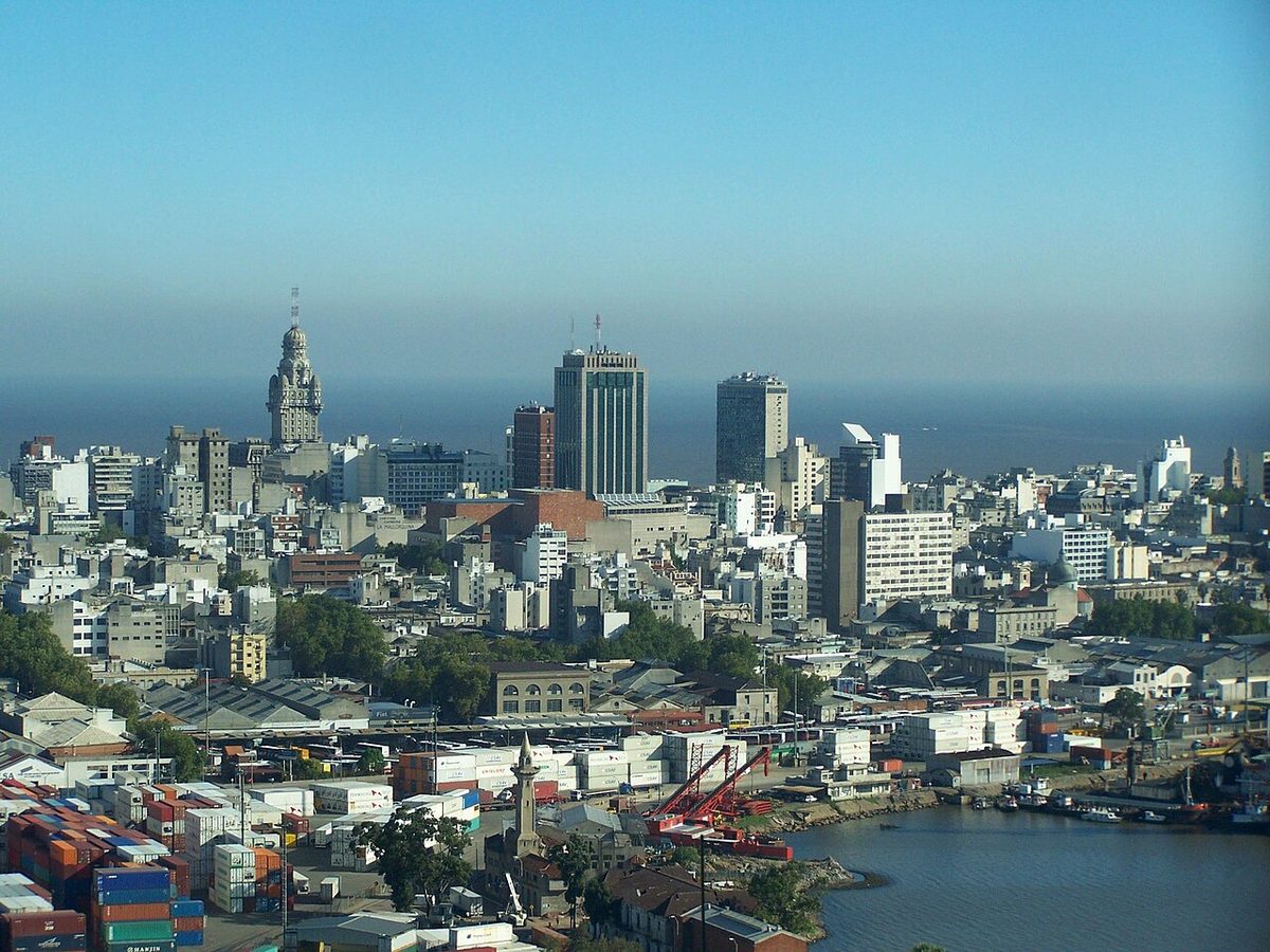 A cobblestone street lined with historic facades in Ciudad Vieja, Montevideo's old city coworking district