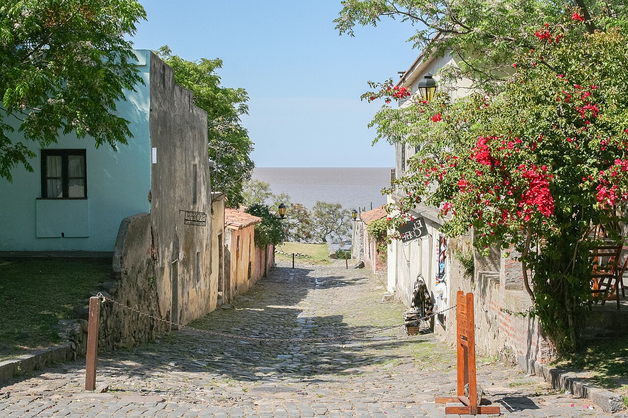 Cobbled lane in Colonia del Sacramento's historic quarter leading down to the R&iacute;o de la Plata