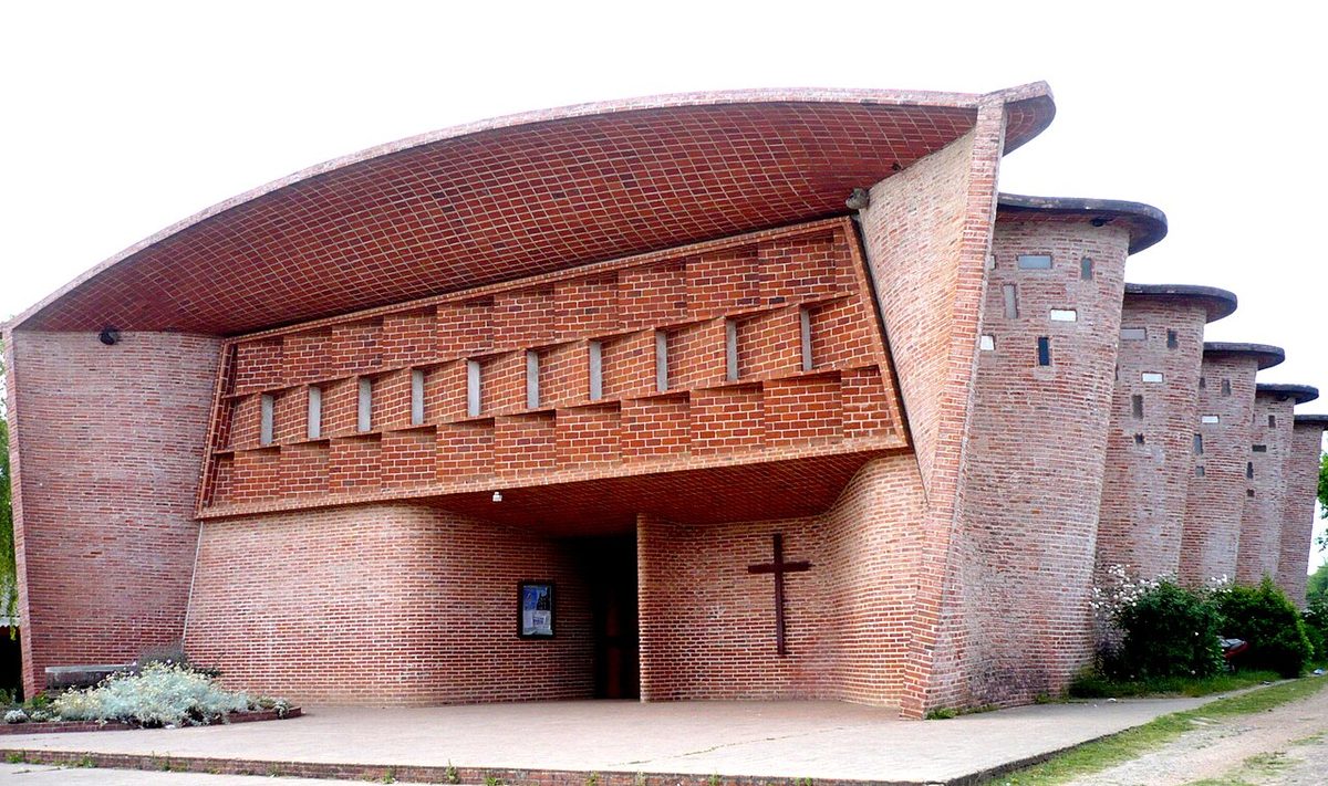 Undulating exposed-brick walls of Eladio Dieste's Cristo Obrero church near Atlántida