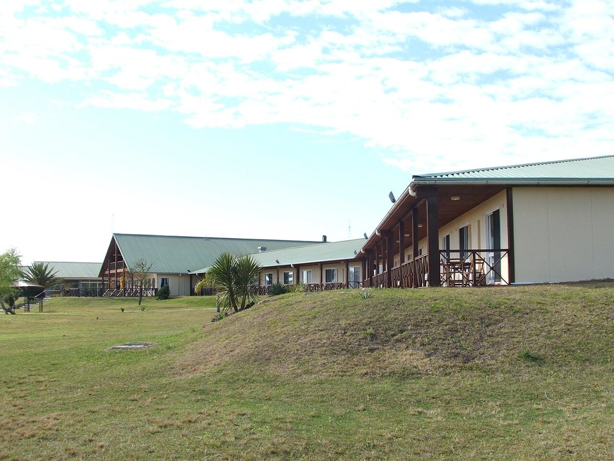 A hotel thermal pool among gardens in the Daymán village