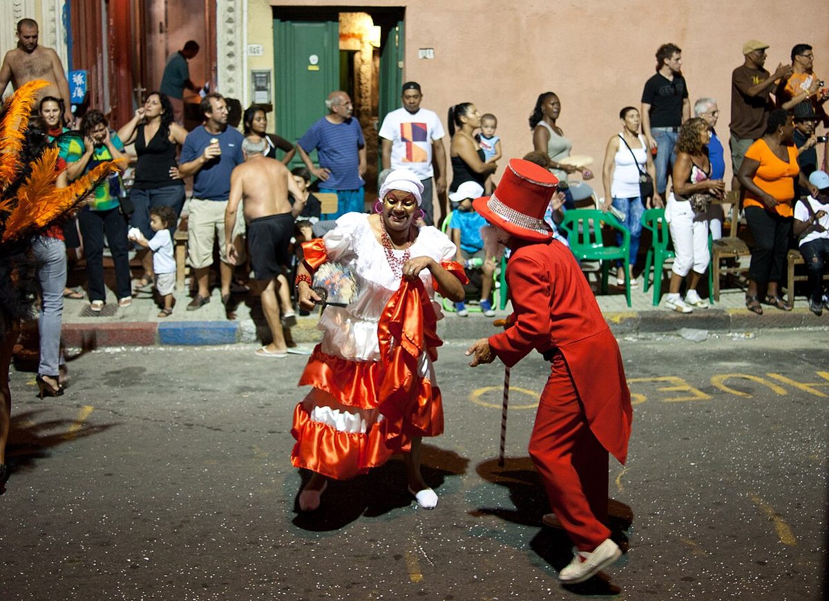 Costumed dancers and crowds at the desfile de llamadas in Montevideo.