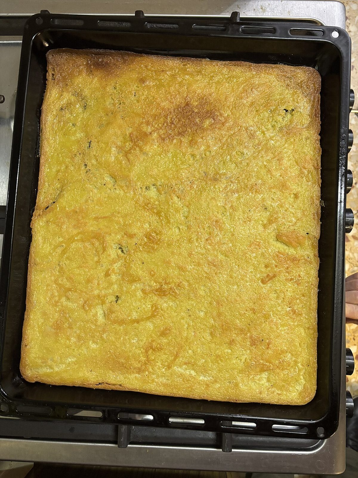 A wedge of faina, the chickpea-flour flatbread served alongside pizza in Uruguay