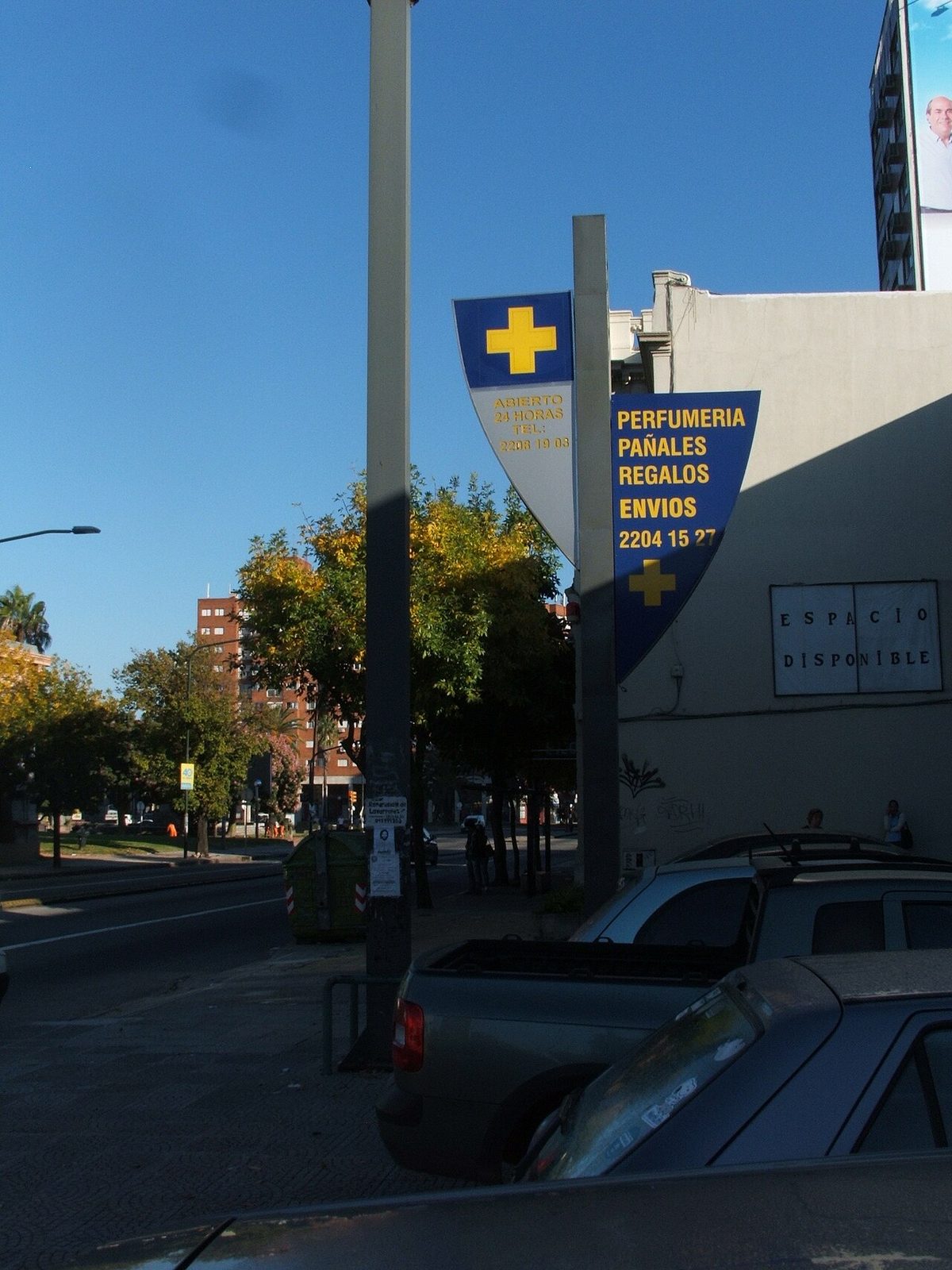 A neighborhood farmacia (pharmacy) on a Montevideo street corner