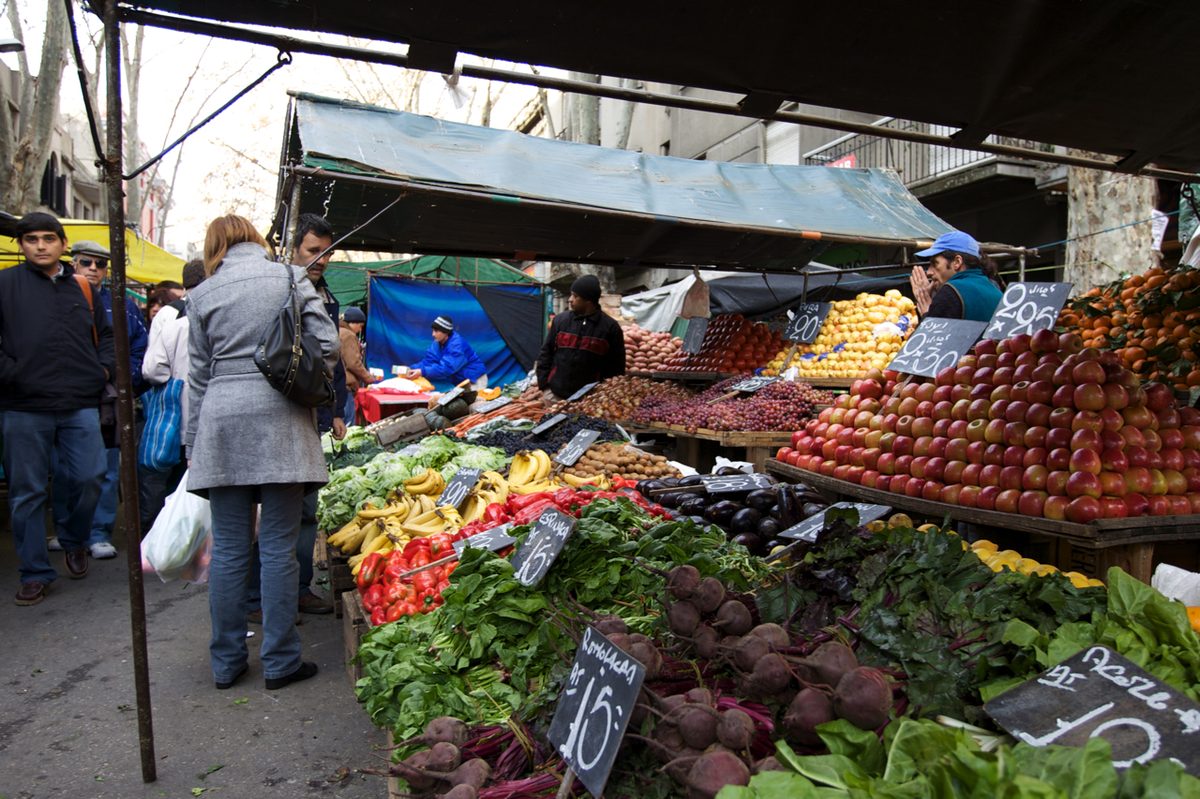 Fresh vegetables piled at a neighborhood feria street market in Montevideo