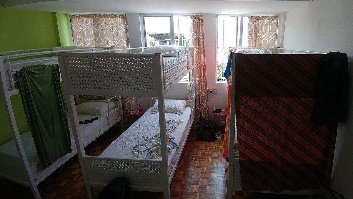 A simple hostel dorm with bunk beds, the budget traveler’s standby