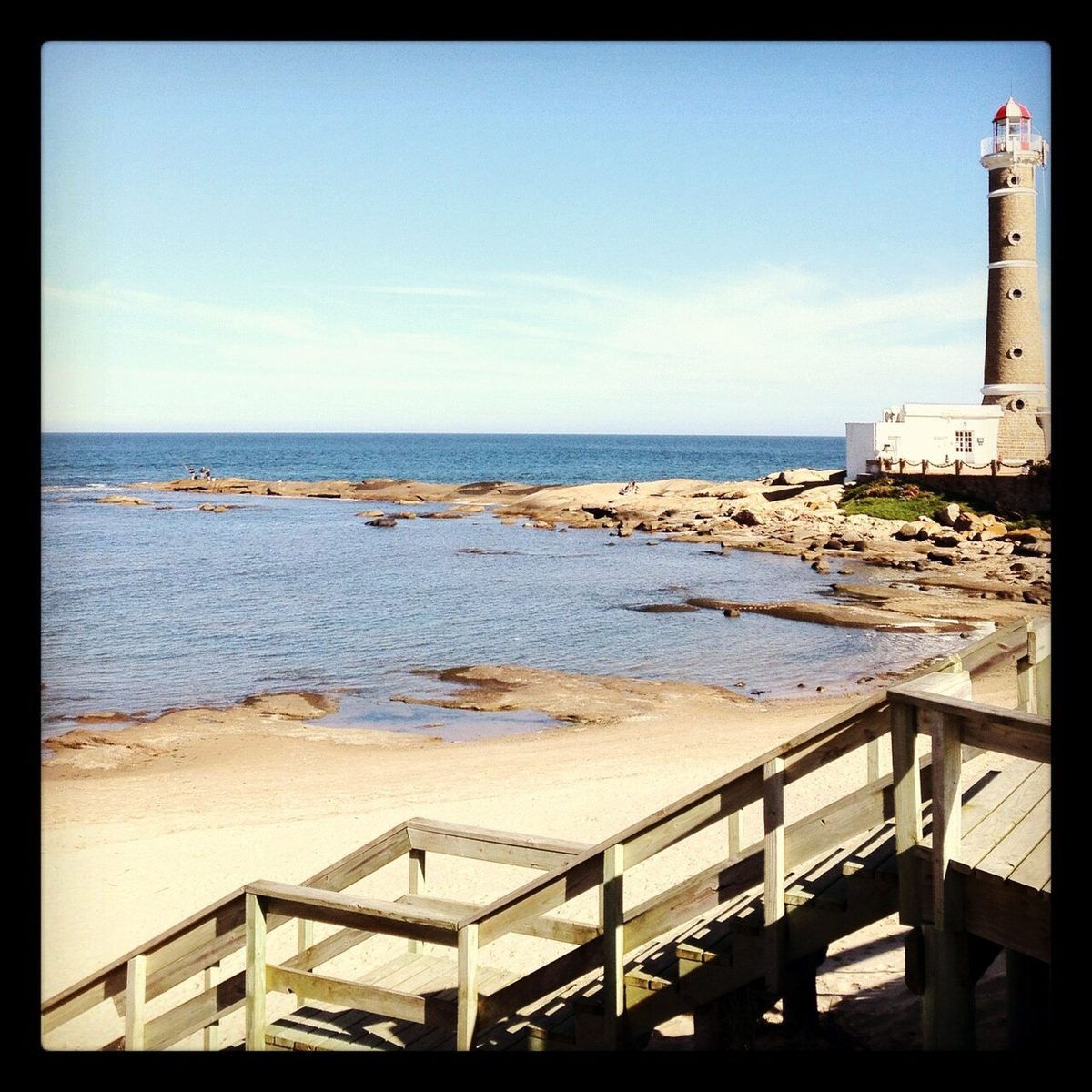 Calm sheltered water and gentle waves on the bay side beach at José Ignacio