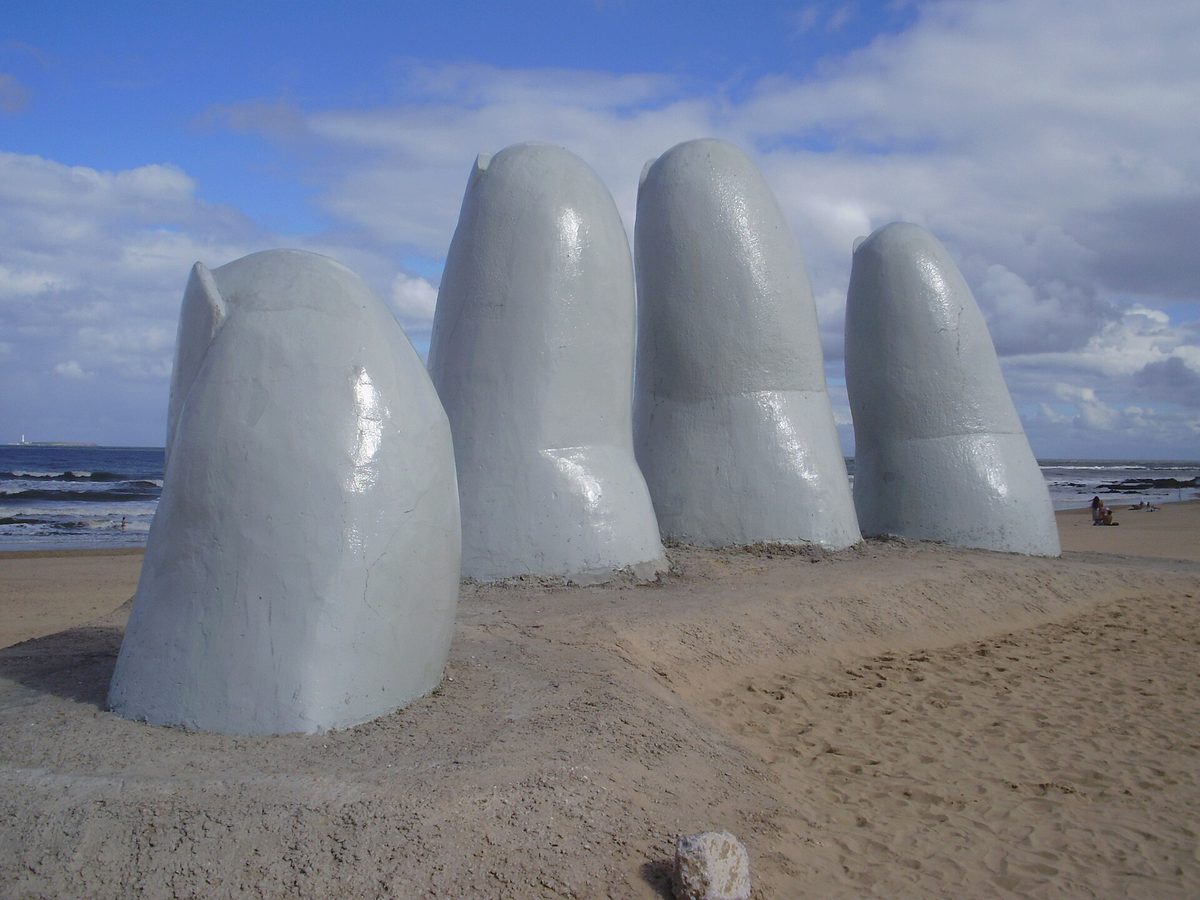 La Mano, the giant hand sculpture rising from the sand of Playa Brava - one of the most famous things to do in Uruguay