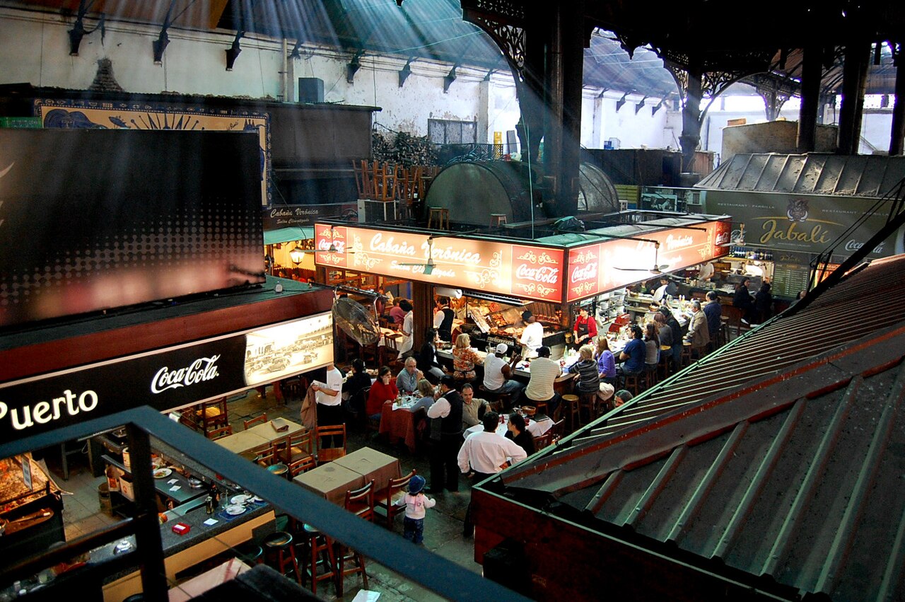 Mercado del Puerto Montevideo interior with iron market hall and parrilla grills Uruguay