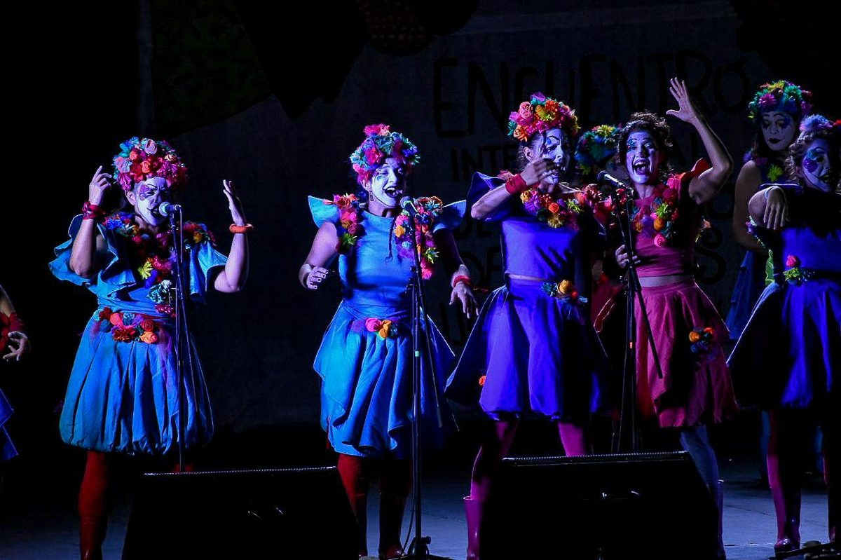 Close-up of elaborate murga costumes and theatrical face paint during Montevideo carnival