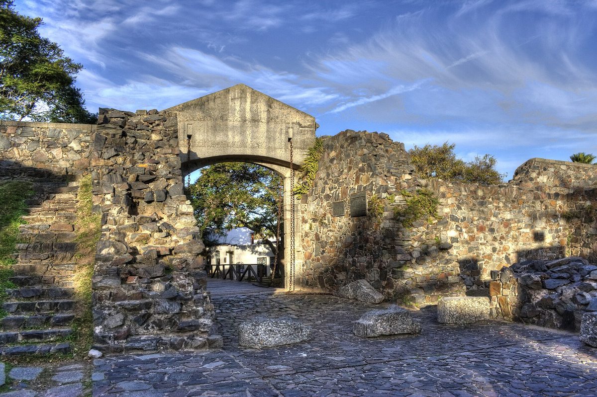 Stone city gate and rampart walls (Porton de Campo) at the entrance to the historic quarter