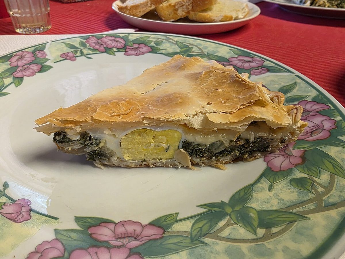 A slice of pascualina, the spinach-and-chard tart eaten across Uruguay