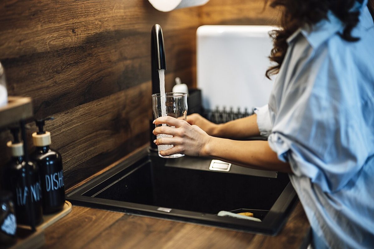 Filling a glass straight from the tap — Uruguay’s tap water is safe to drink